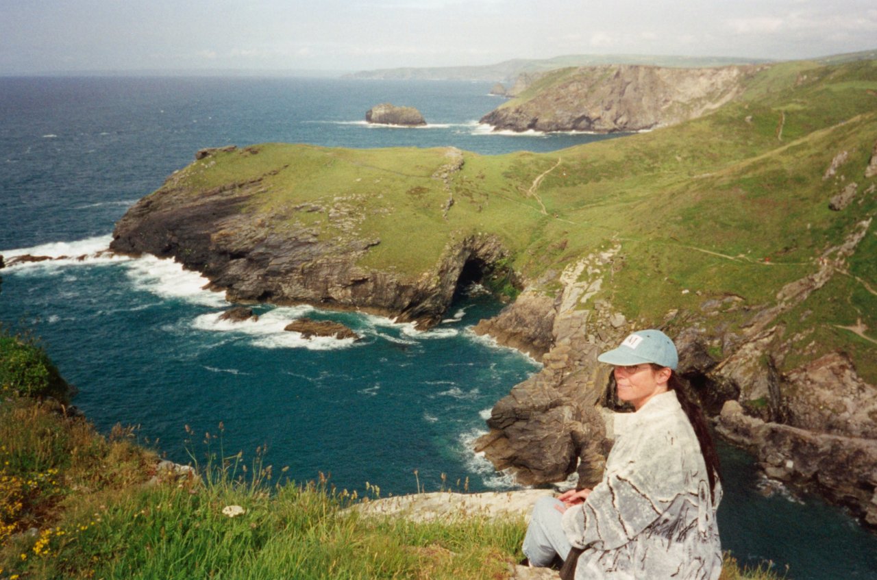 AandM at Tintagel- Merlins cave below